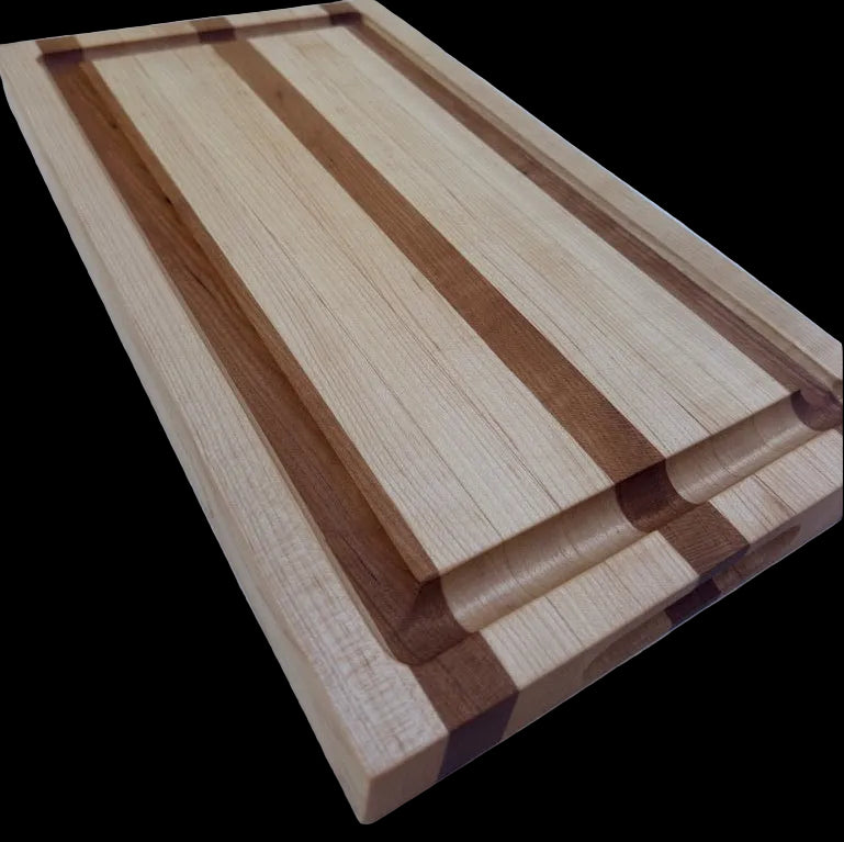 Wooden cutting board with a striped pattern on a white surface