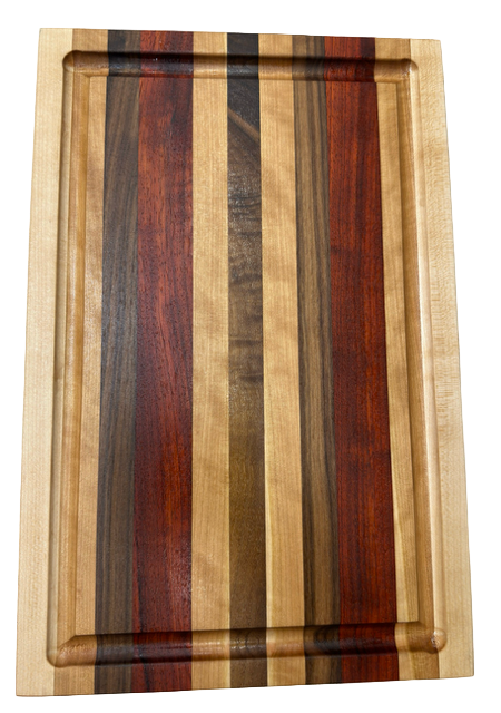 Wooden cutting board with multicolored stripes on a light gray background