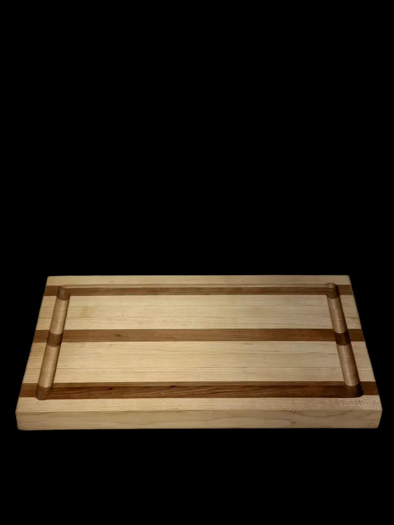 Edge grain cutting board thickness 1.125 inches.