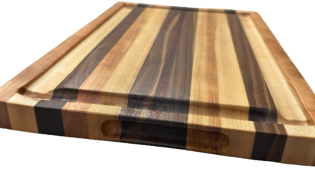 Wooden cutting board with multicolored stripes on a white surface