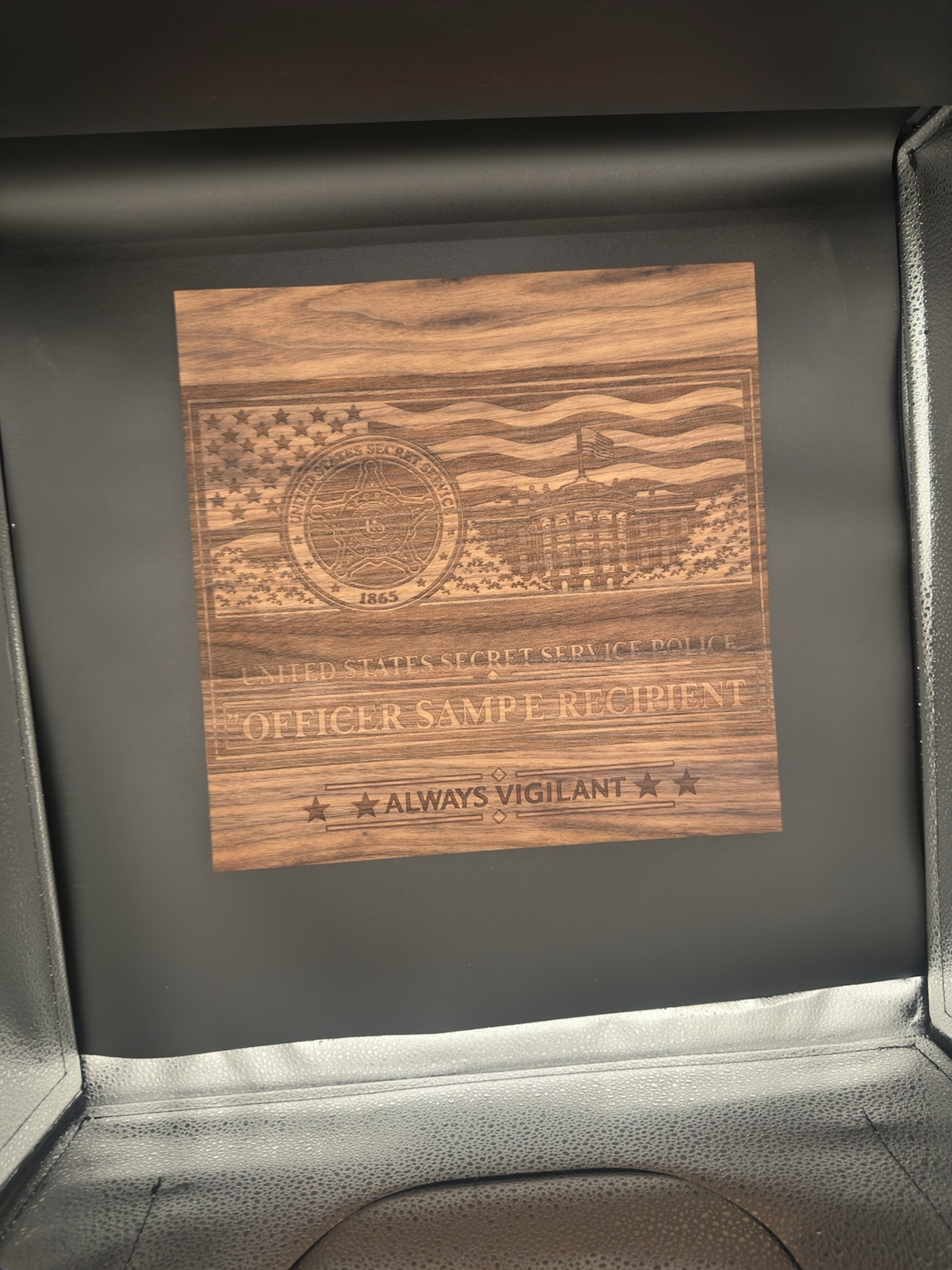 Custom 16 by 12 black walnut retirement and recognition plaque with sample recipient name